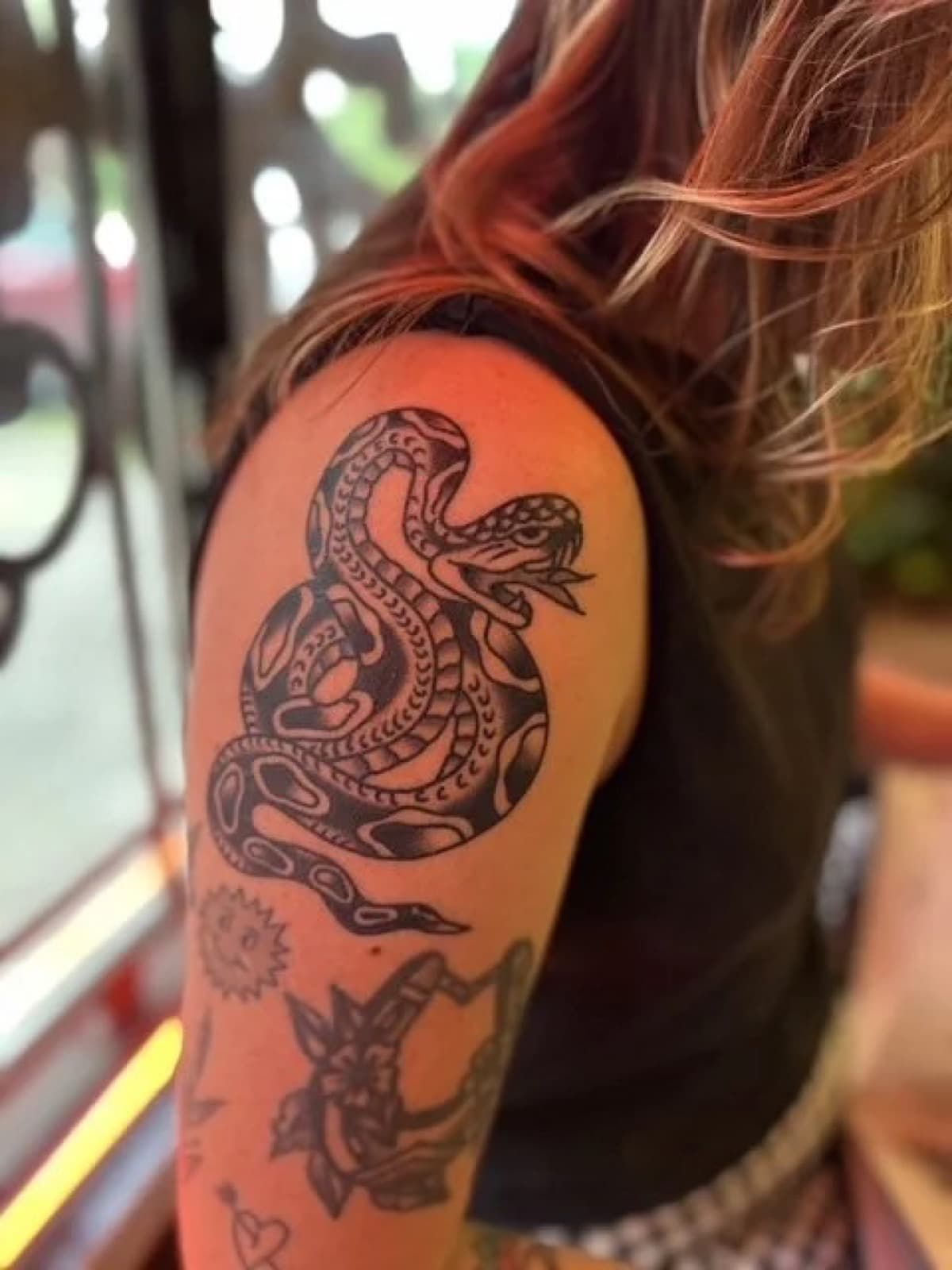 Traditional snake tattoo by Tony J. Vyeda at Historic Tattoo Portland